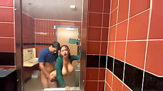 Busty babe gets public creampie in bathroom