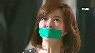 Korean beauty gagged and choked on big cock in BDSM fetish video