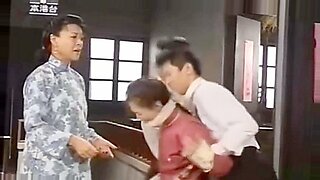 Bound Asian beauty gags on huge cock