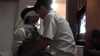 Blindfolded amateur Asian girl experiences rough BDSM play by experienced partner.