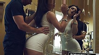 Seductive Ryan Conner teases in tight dress.