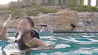 Public beach sex leads to pussy showing and underwater creampie.