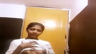 Bangladeshi beauty Nowrin teases with big tits in solo webcam show.