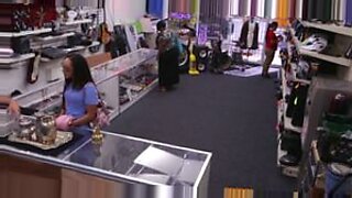 Latina pawnshop employee trades oral sex for cash.