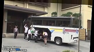 Japanese girl pleasured by two girls on a bus
